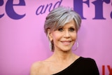 Jane Fonda smiles at a red carpet event