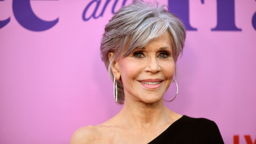 Jane Fonda smiles at a red carpet event