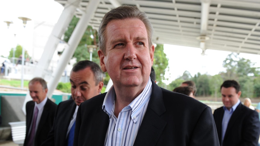 NSW Premier Barry O'Farrell and his Ministers, greeted by protests in Newcastle last night.