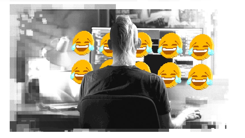 A black and white image of a man sitting at a computer. In front of him float several 3D laughing-crying emoji.