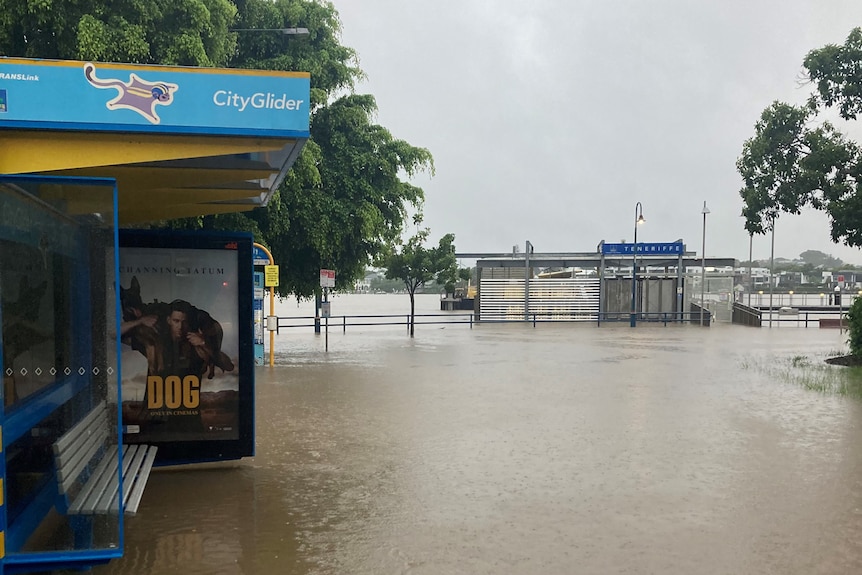 A bus and ferry station with high water.