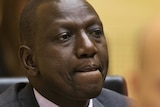 William Ruto listens at his trial in The Hague.