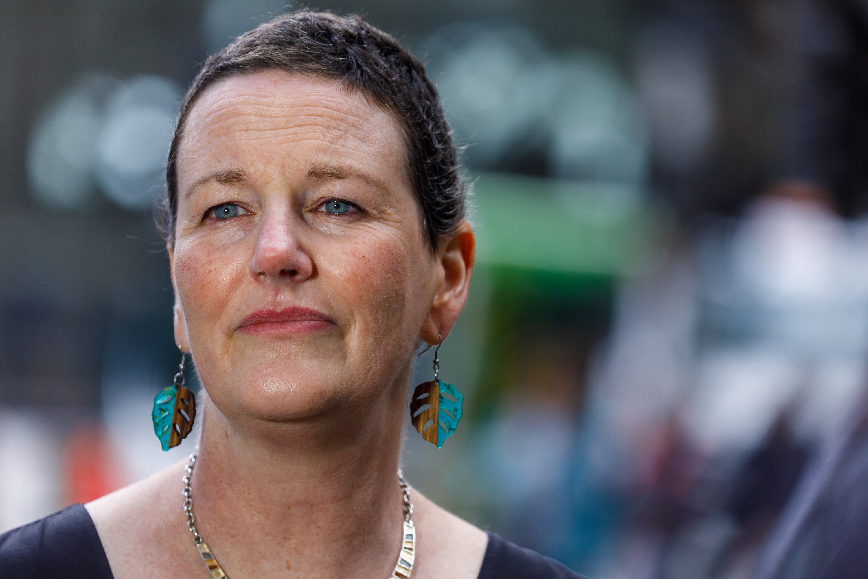 Close up photo of Robyn Schofield looking concerned