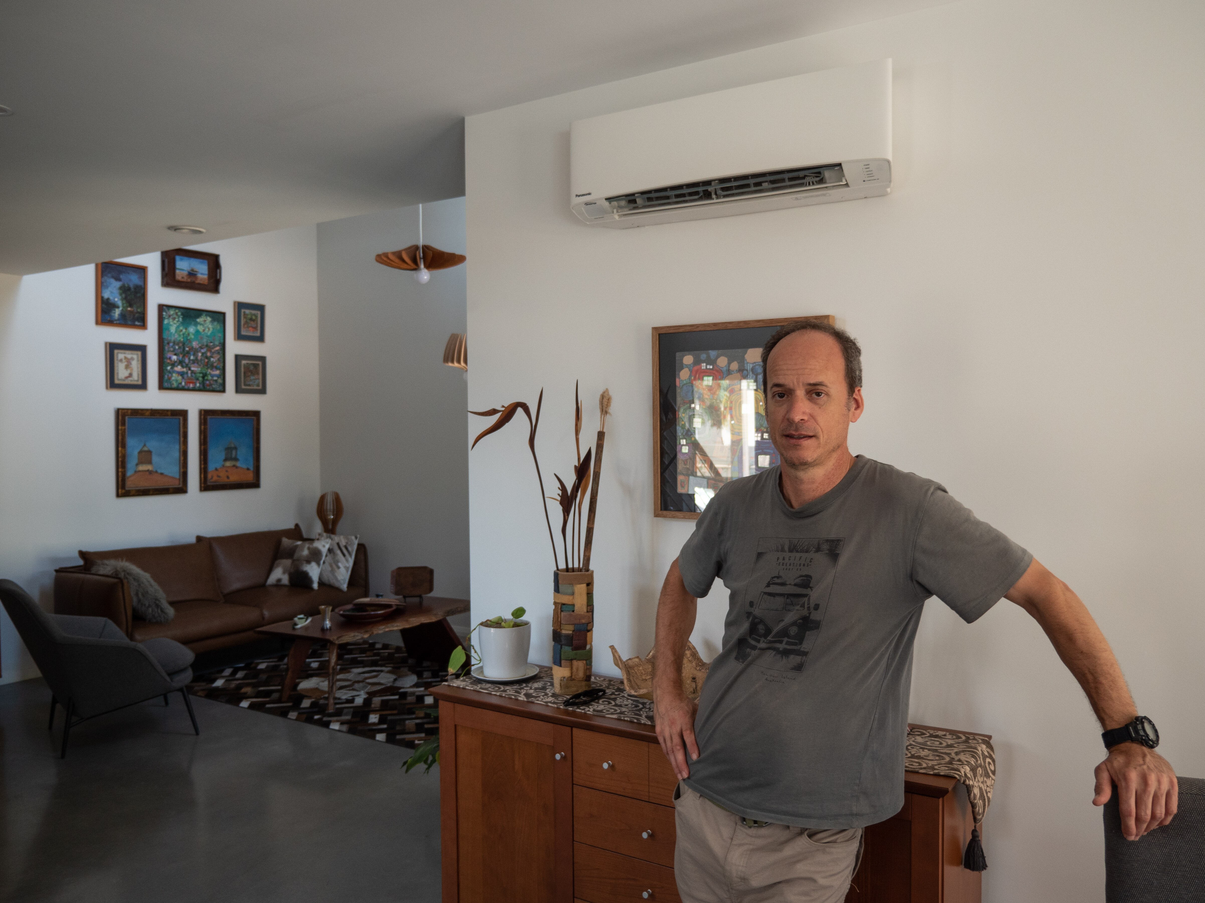 Carlos Acuna with air conditioner