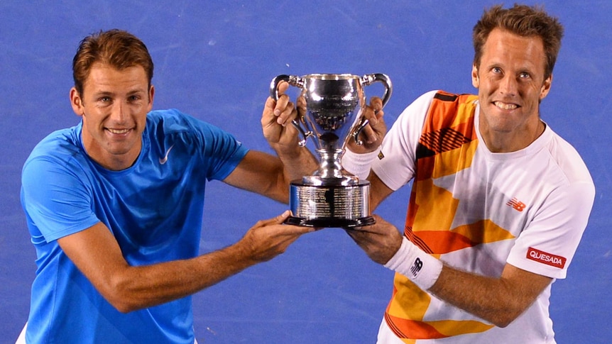 Lukasz Kubot and Robert Linstedt with the Australian Open mens doubles trophy
