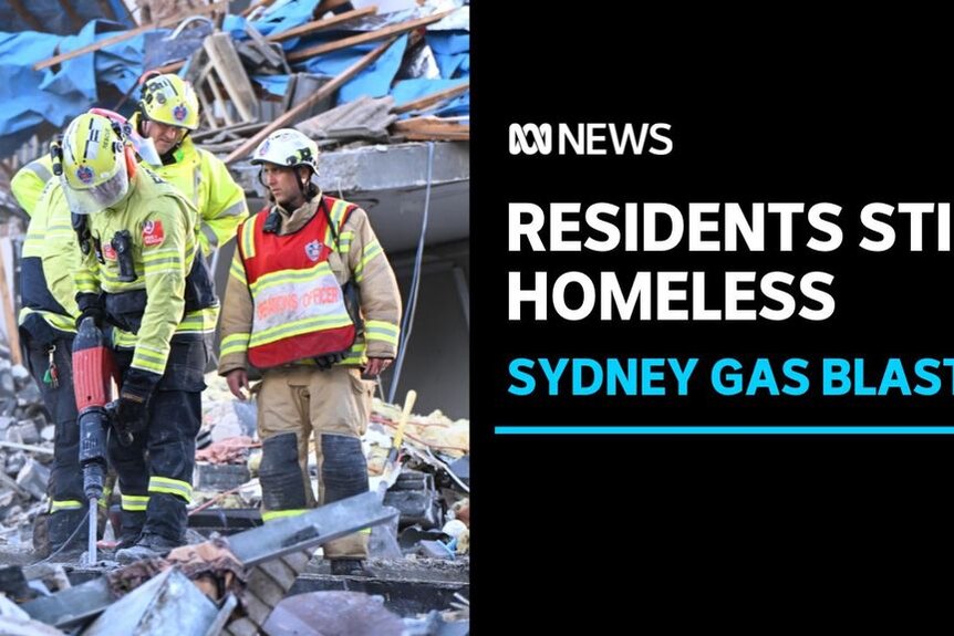 Residents Still Homeless, Sydney Gas Blast: An emergency worker jackhammers through rubble while two others stand by.