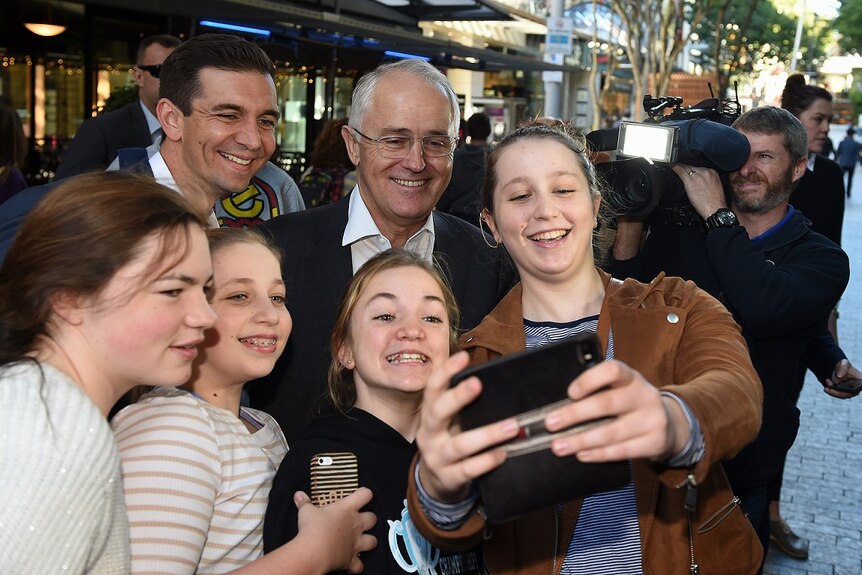 Mr Turnbull (right) Mr Evans taking selfies after winning last year's federal election.