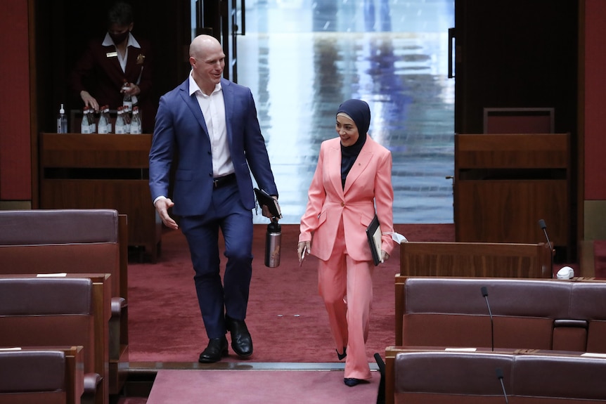 David Pocock and Fatima Payman walk into the Senate 