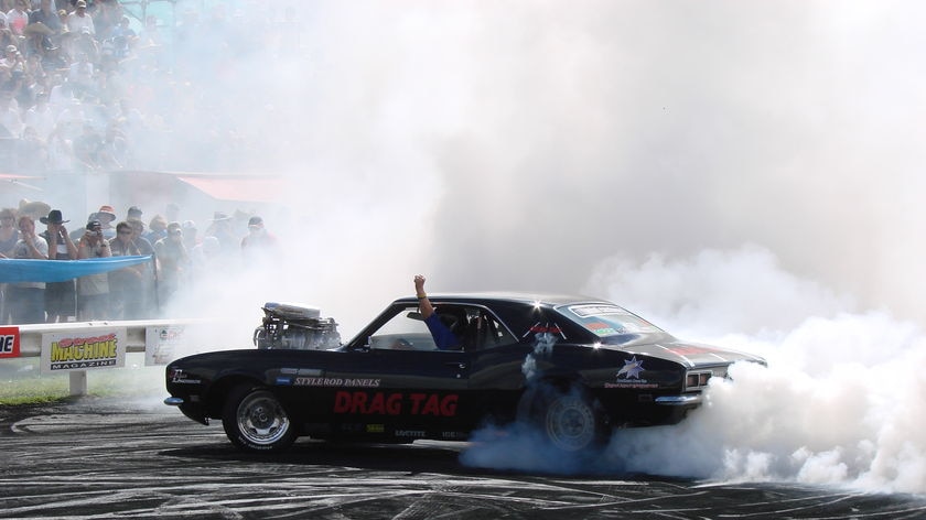 A car does a burnout at Summernats.