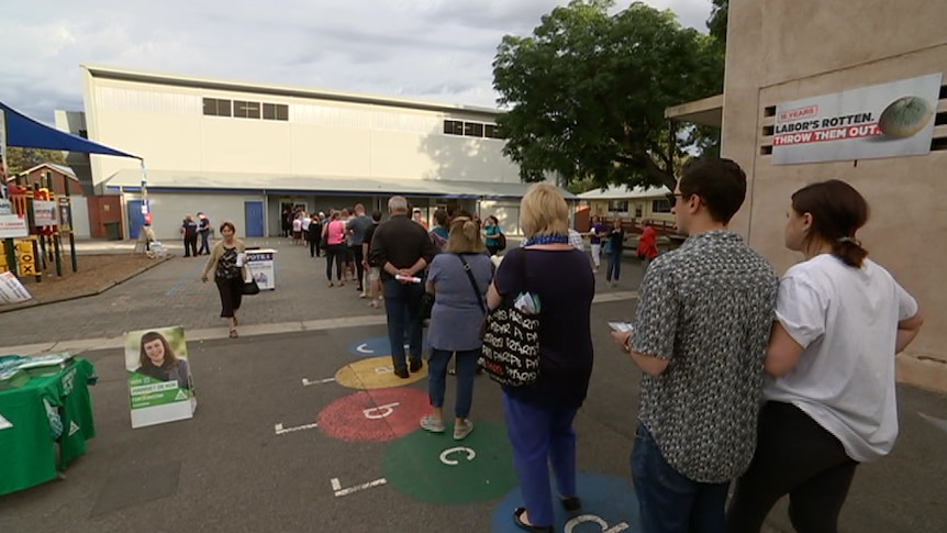 Voters line up on their way in to the polling booth in Adelaide