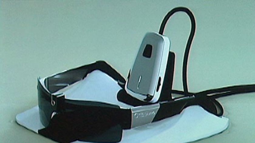 The prototype consists of a miniature camera mounted on a pair of glasses.