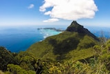 A view from a mountain top, looking over an island.