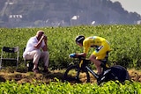 Chris Froome rides past spectators during the stage 11 time trial of the Tour de France.