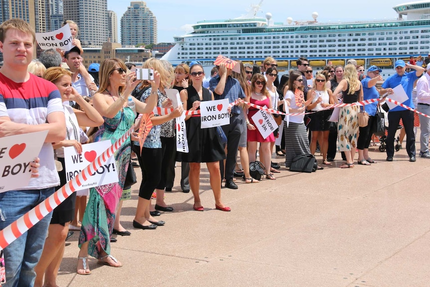 Fans gather to watch Iron Boy take on Ultron at the Sydney Opera House.