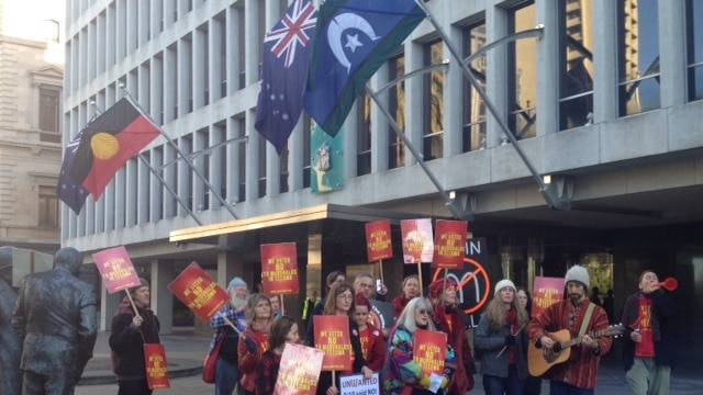 Protesters calling for a halt to construction of a McDonalds at Tecoma, take their demonstrations to Treasury Place