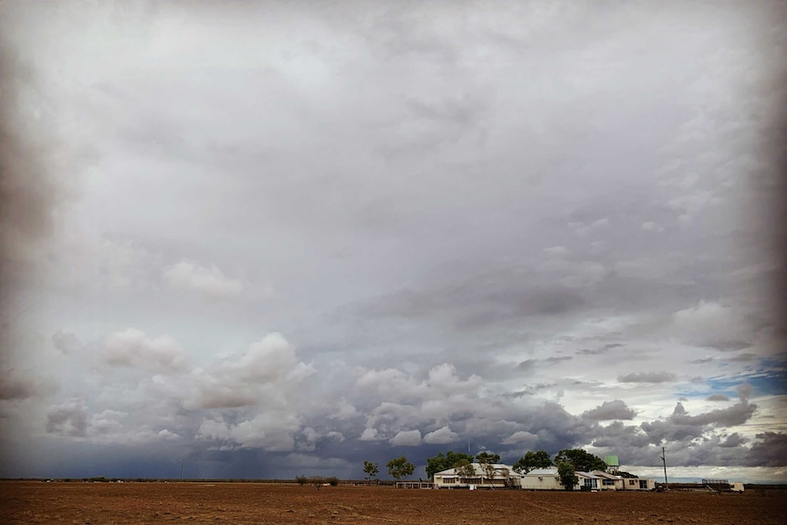 Storm clouds form over the farm house at Wando Station near Winton.