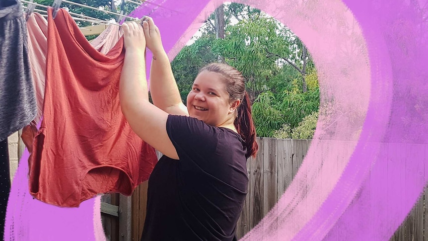 Nataasha Torzsa hangs out washing on a clothes line for a story on green laundry tips.