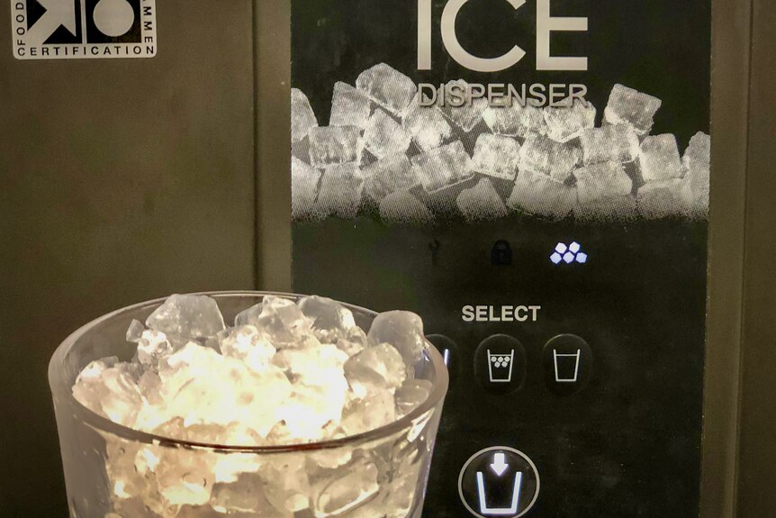 A close up of a crushed ice machine.
