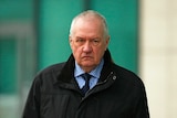 David Duckenfield frowns as he leaves after giving evidence to the Hillsborough inquest.