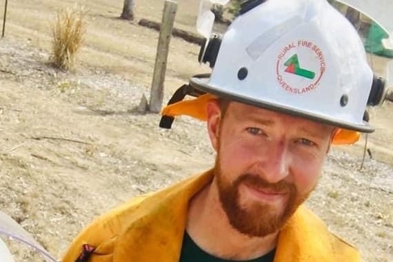 A man wearing a firefighter's uniform