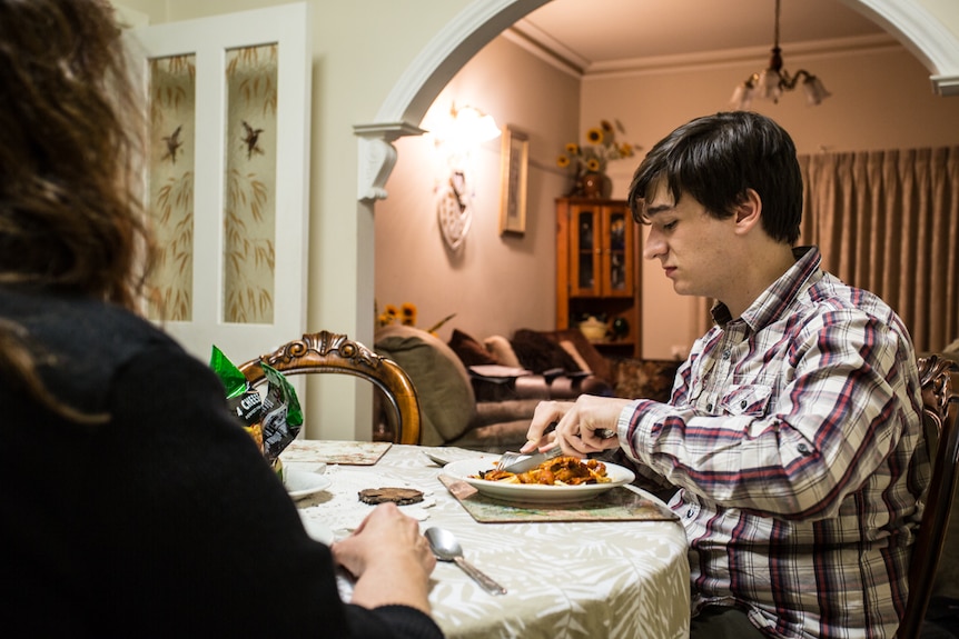 Student Jack Surplice eats his dinner at his aunt and uncle's house.