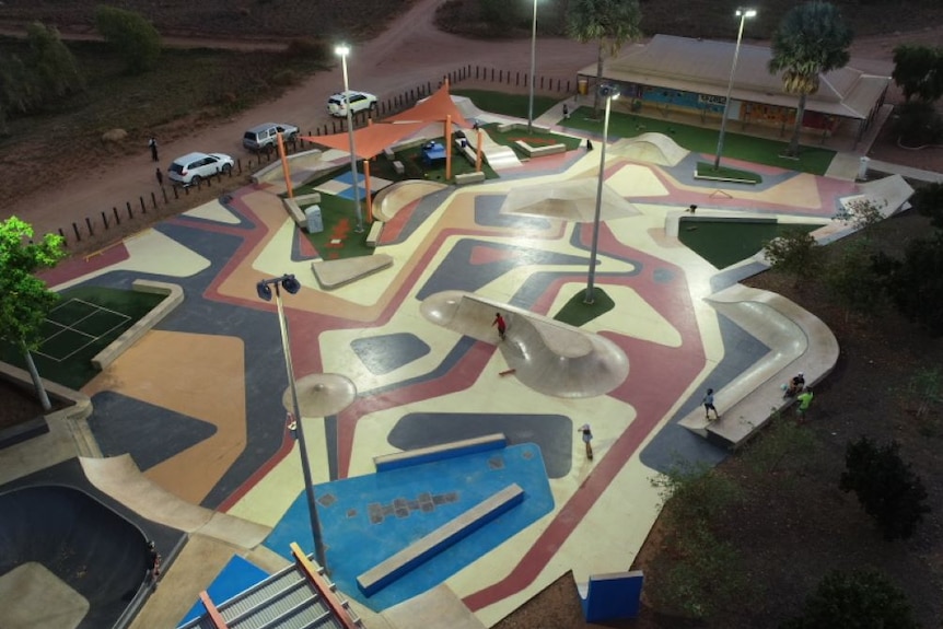 A multi-coloured skatepark pictured from above