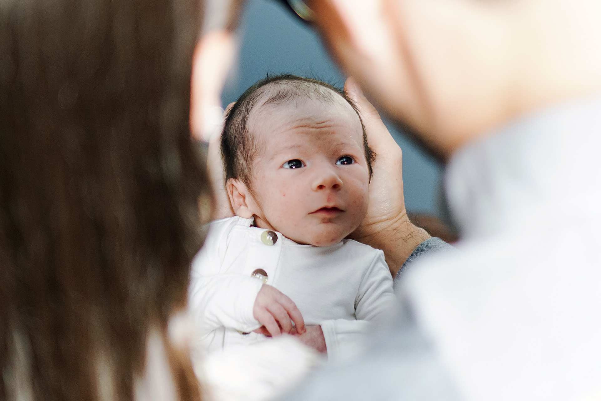 new born baby with parents