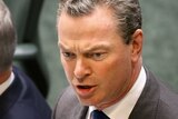 Christopher Pyne stands at the dispatch box as he speaks in the House of Representatives.