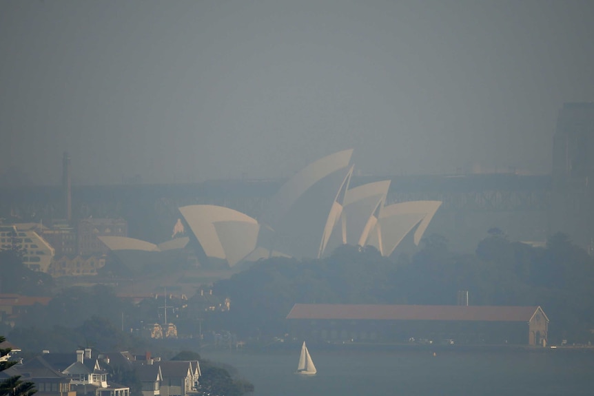 The Sydney Opera House covered in haze from hazard reduction burns.
