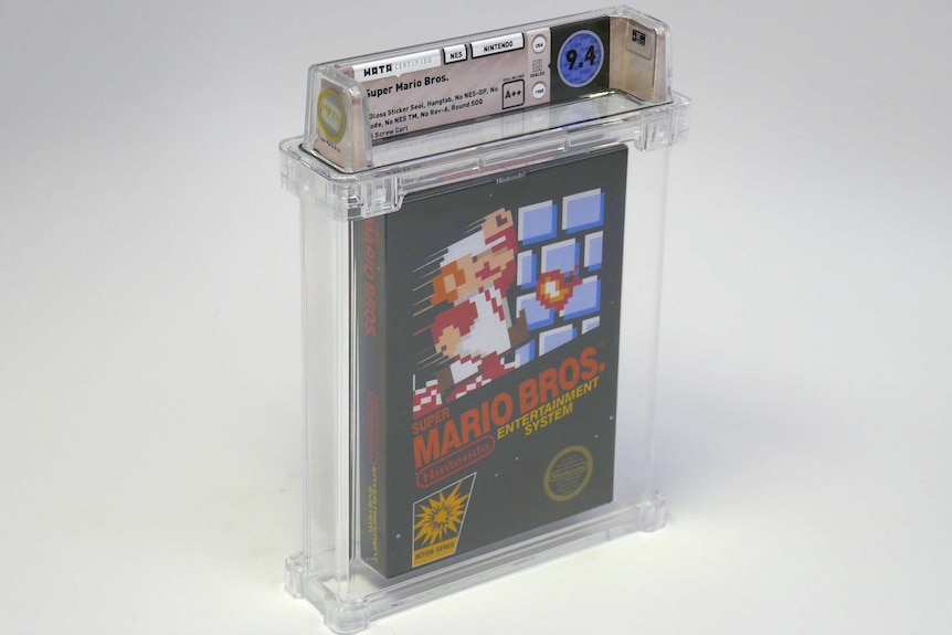 The near-immaculate copy of Super Mario Bros sits instead a clear plastic case.