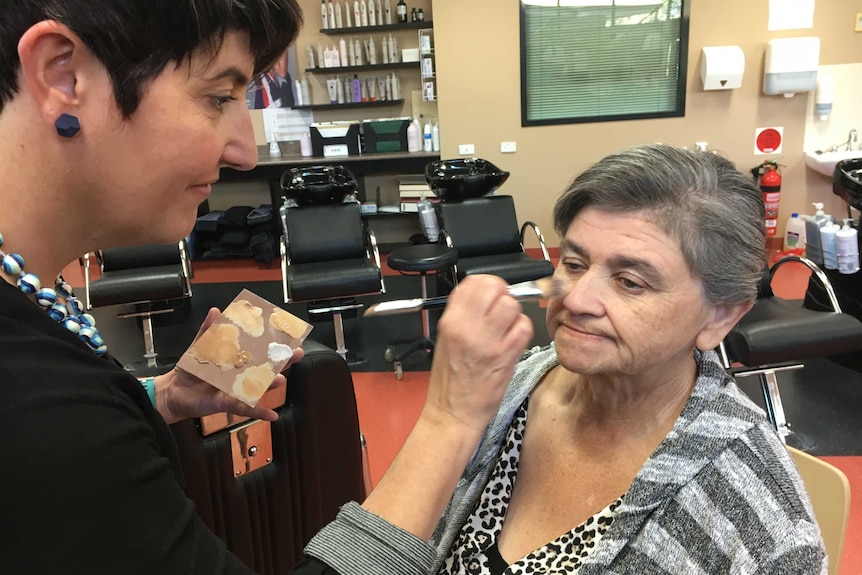 Gail Cummings getting her makeup done by beauty therapist Amanda Bordignon