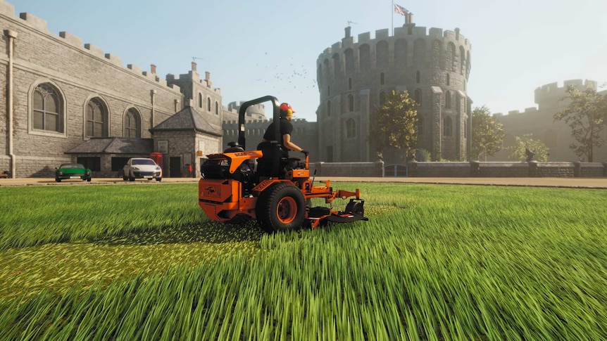 Man on ride on lawn mower in long grass in the grounds of a castle