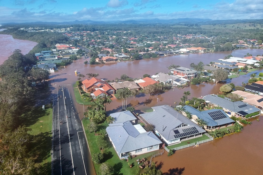 Flooded houses on the canal system in the south of Pottsville on the Northern Rivers.