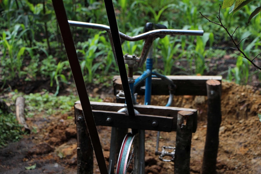 An old bike used to pump water