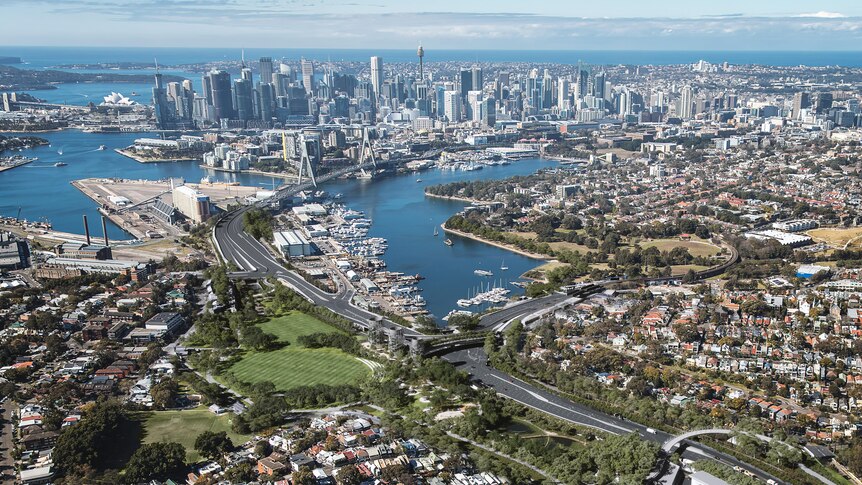 An aerial photograph showing Sydney city with the Rozelle highway development in the centre.