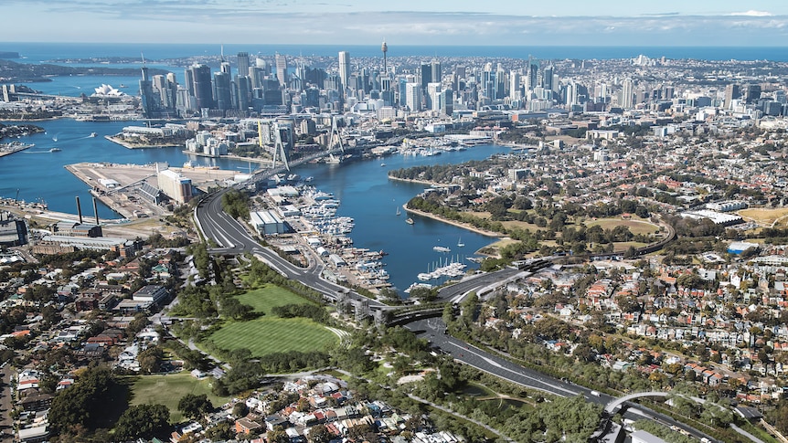 An aerial photograph showing Sydney city with the Rozelle highway development in the centre.