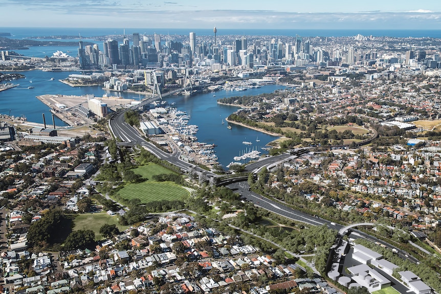 An aerial photograph showing Sydney city with the Rozelle highway development in the centre.