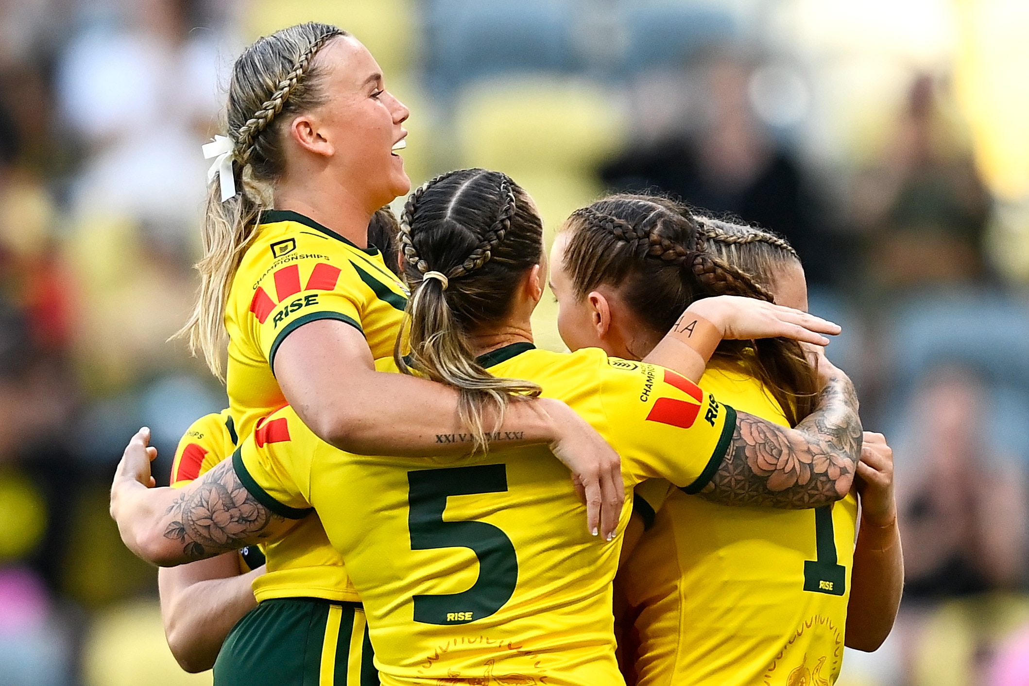 Tamika Upton hugs her teammates