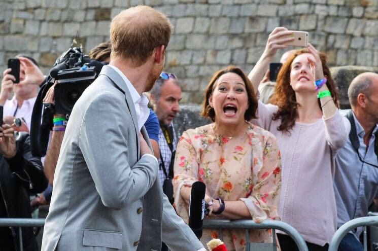Lisa Millar shouts a question at Prince Harry.