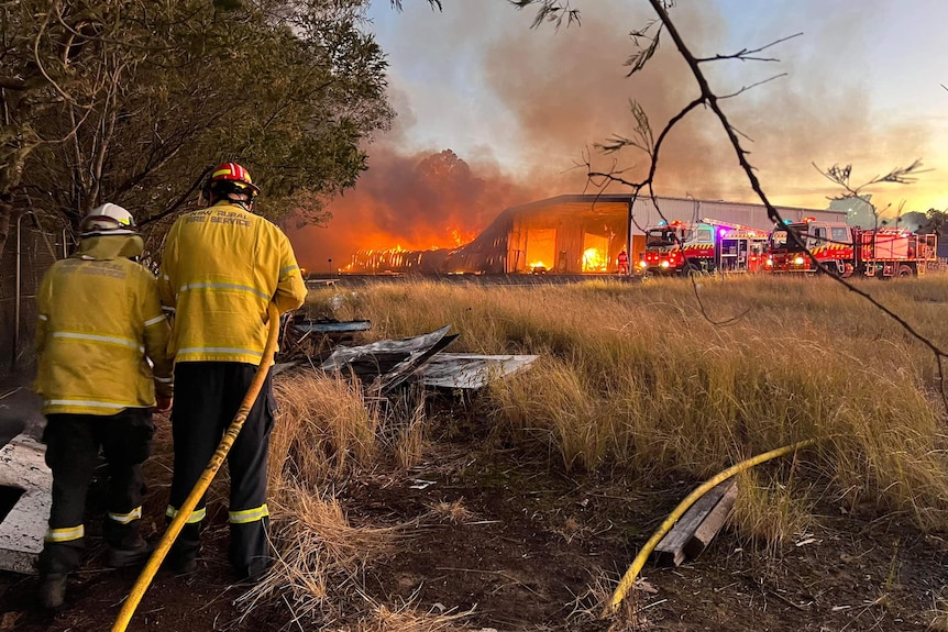 Image of fire fighters at scene of factory fire in NSW