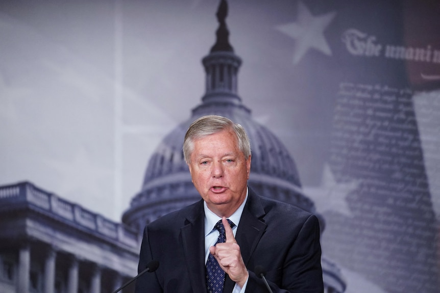 A portrait of Lindsey Graham against the backdrop of the US capitol building. 