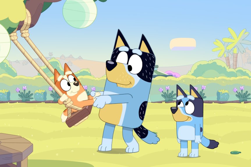 Still from Bluey episode The Sign showing three cartoon dogs in a backyard playing on a swing.