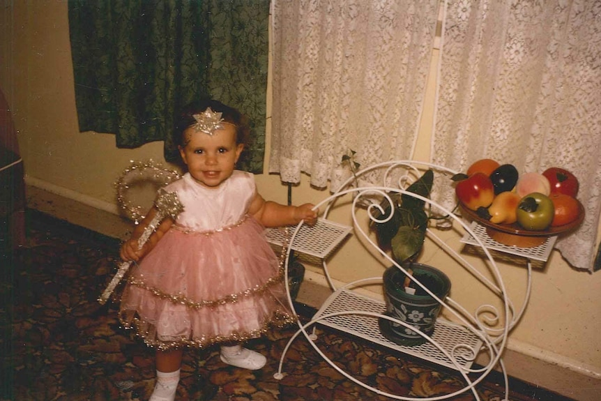 Indigenous poet Ali Cobby Eckermann as a toddler dressed in a fairy costume.