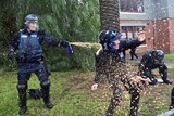 Police deploy capsicum spray as anti-immigration and anti-racism protesters clash in Coburg in Melbourne