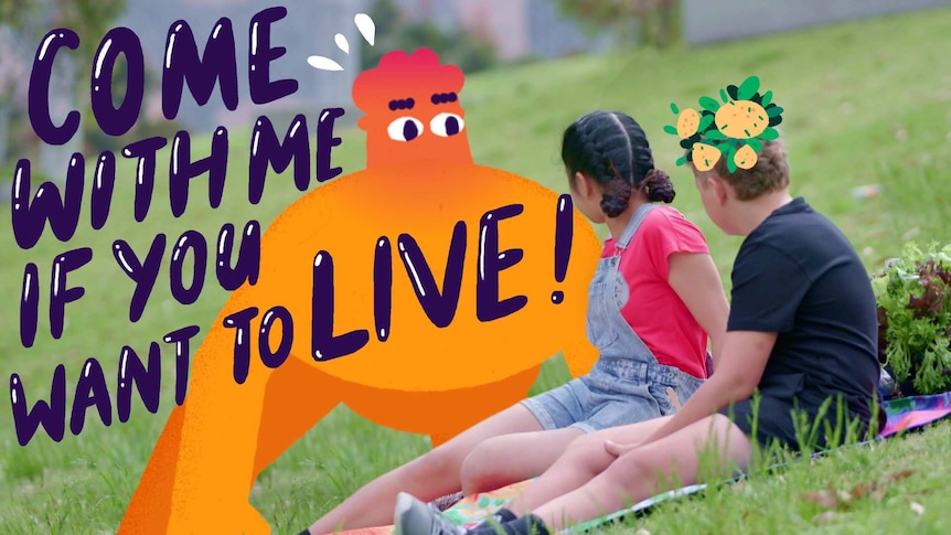 Teenage boy and girl sit on grass looking at cartoon figure, text reads "Come with me if you want to live!"