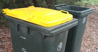 Yellow lid recycling bin