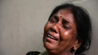 A woman cries in Sri Lanka