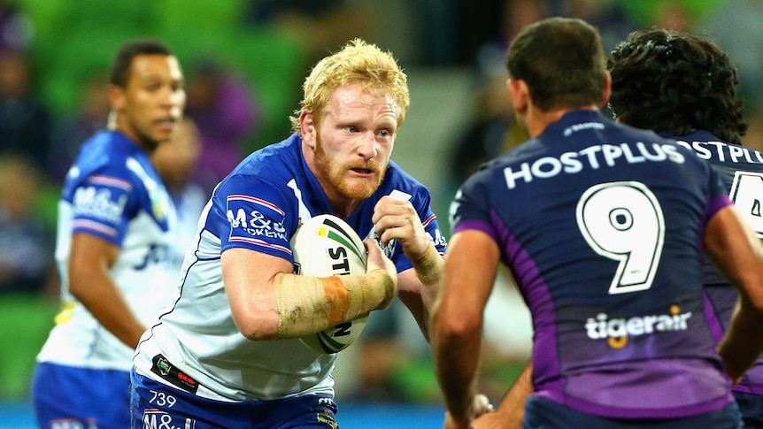James Graham charges into Cameron Smith