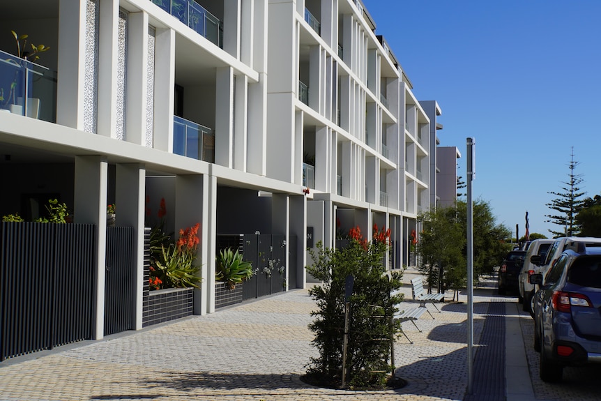 A street level view of an apartment block