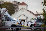 Investigators work at the scene of a deadly shooting at a church in Texas.